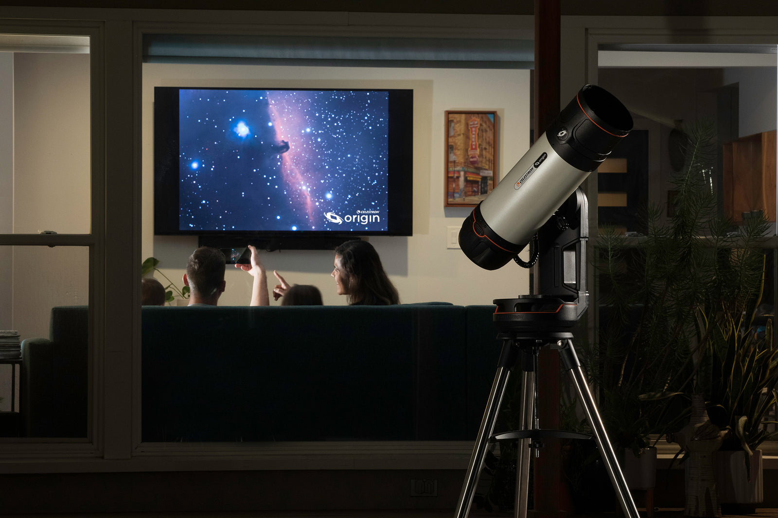 Celestron Origin displaying a live deep-sky image on a television during a shared observing session