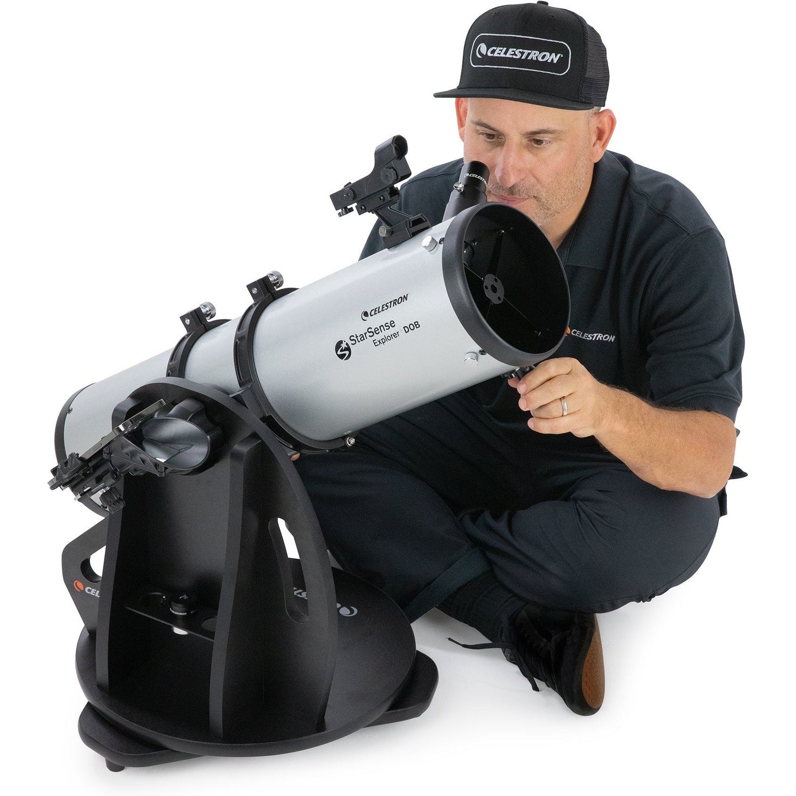 Celestron StarSense Explorer 150mm tabletop Dobsonian being carried